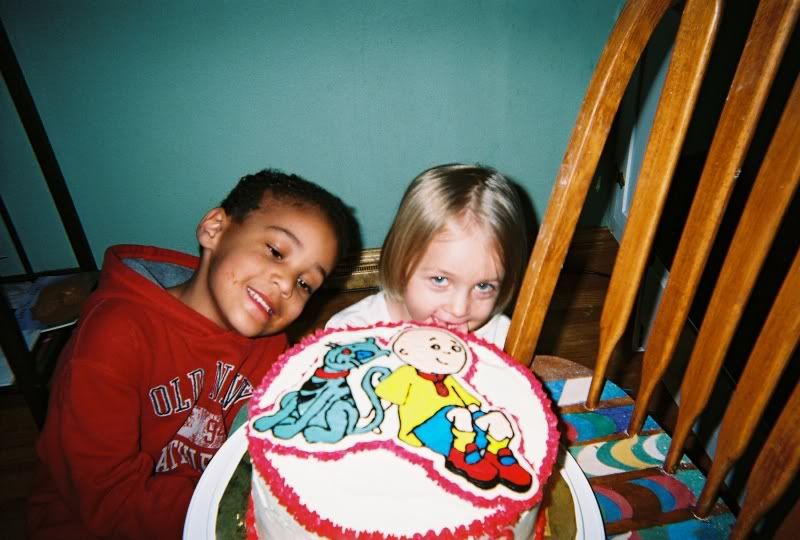 Posing, with cake