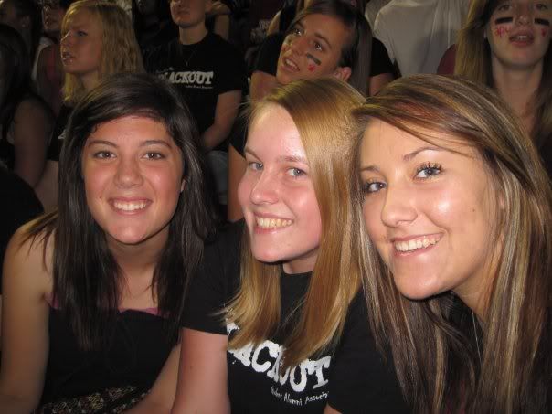 Wearing our Blackout at the football game :)