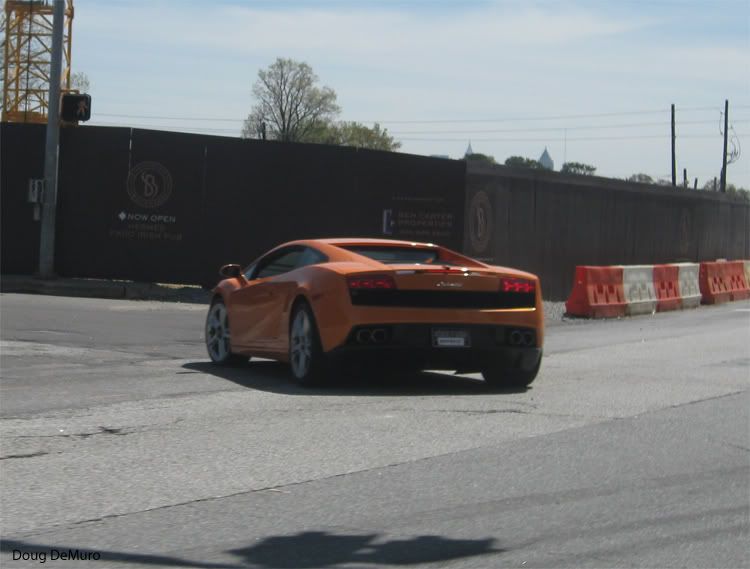 orange Lamborghini Gallardo LP560 on temporary plates at Peachtree near West