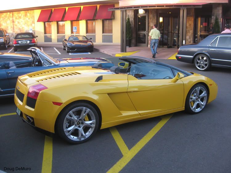 yellow Lamborghini Gallardo Spyder on vanity plate NADI1 at Elway's