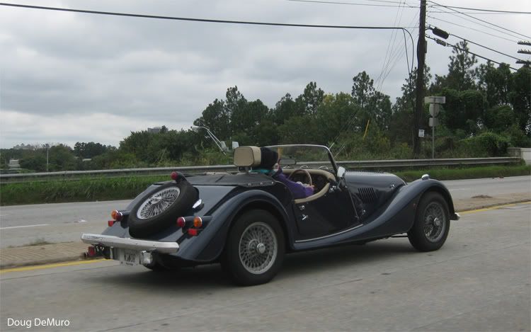 dark gray Morgan Roadster on vanity plate NINOR on Piedmont approaching 