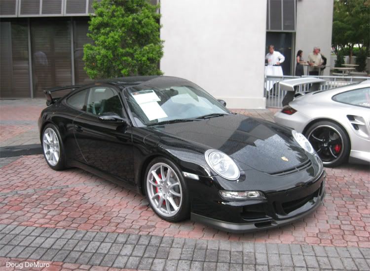 black Porsche 911 GT3 997 on display from Jim Ellis along with another